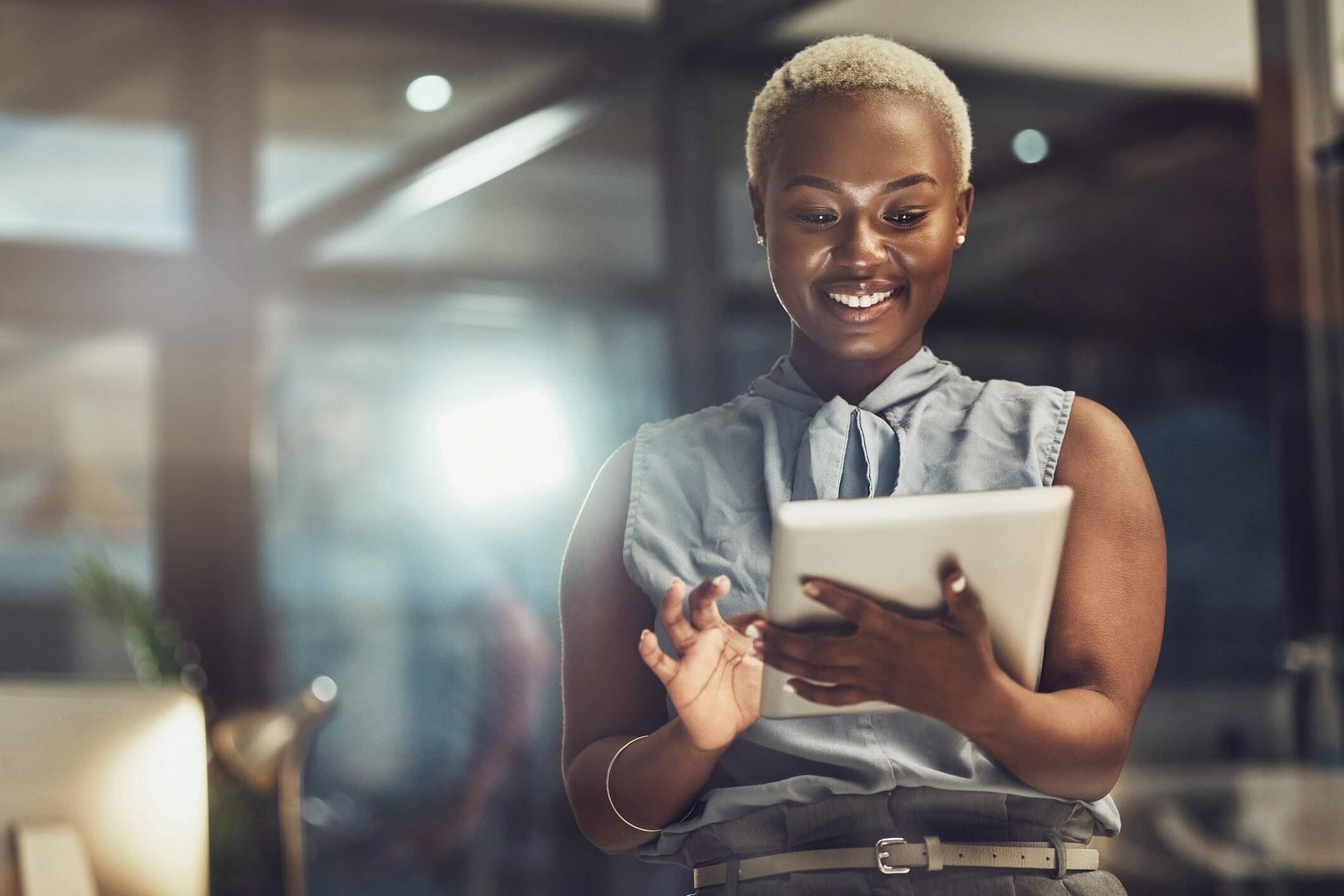 woman looking on iPad